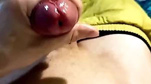 The guy jerks off with moans and cums