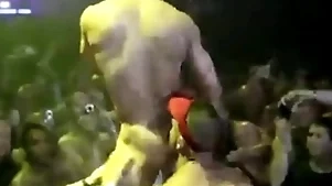 Gay pornstars encircling public stage