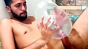 Fucking an puffed up condom until i cum in quod it. i fuck it as a result deep it explodes. wonder how would it feel inside your ass